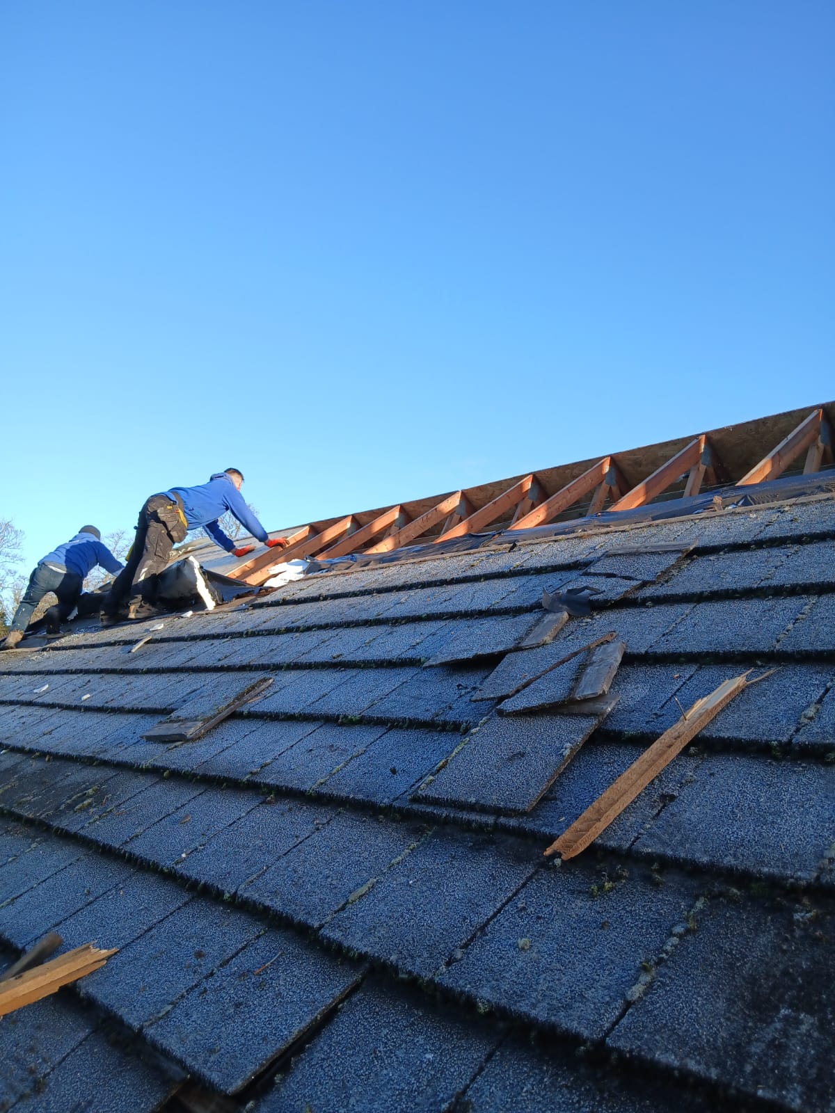 After - new boarding, membrane and tiles